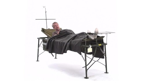 US Military Surplus Foldable Field Hospital Bed / Cot - image 1 from the video